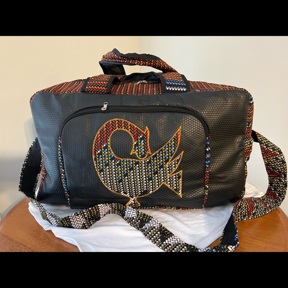 Tote/travel bag handmade in Ghana, West Africa. Adorned with the Sankofa symbol